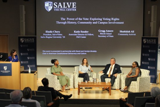 Panelists on stage at Pell Center event