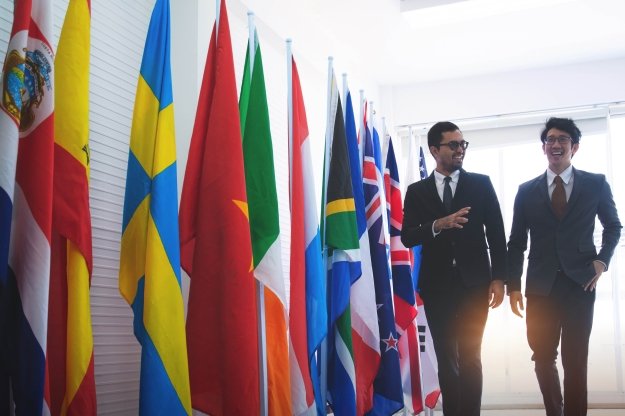 international flags and two men