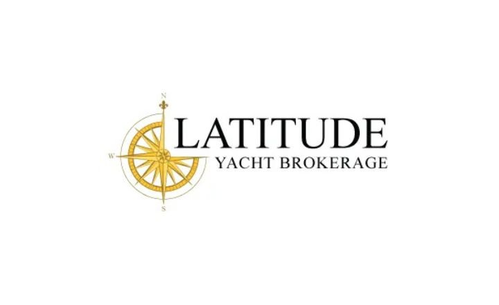 Golden compass with latitude yacht brokerage written to the right of compass 