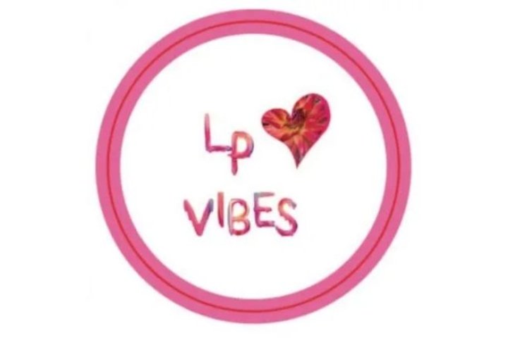 LP Vibes written in a pink circle with a red heart