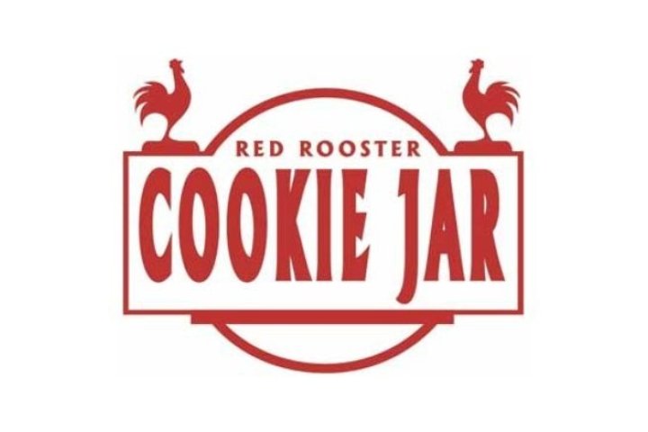Two red roosters facing the center and Red Rooster Cookie Jar centered between the two