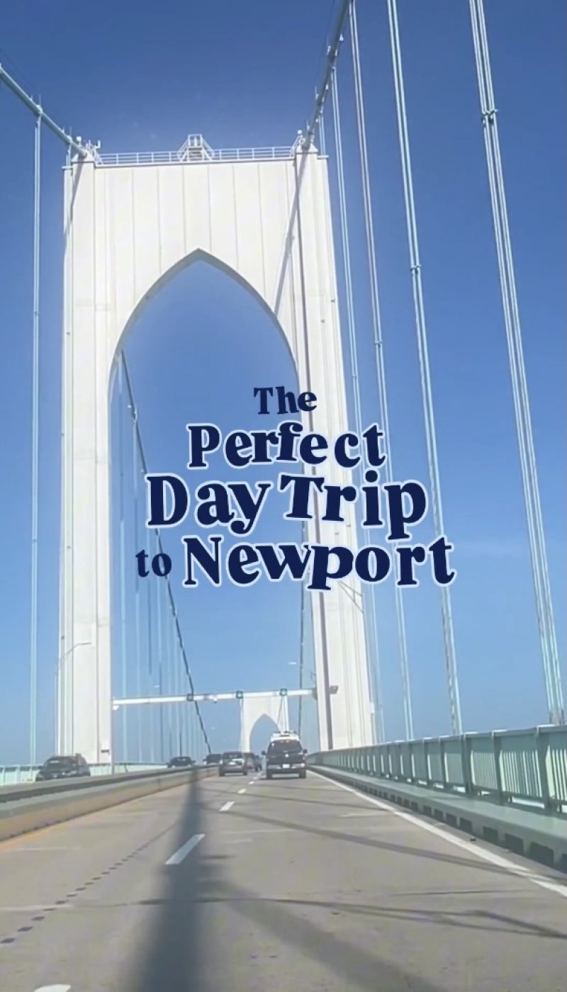 Cars driving over a suspension bridge with the words "The Perfect Day Trip to Newport" in the foreground.