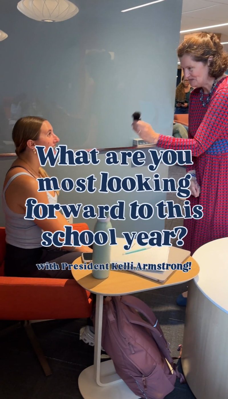 A woman who is standing interviews a woman who is seated; text on the image reads: What are you most looking forward to this school year?