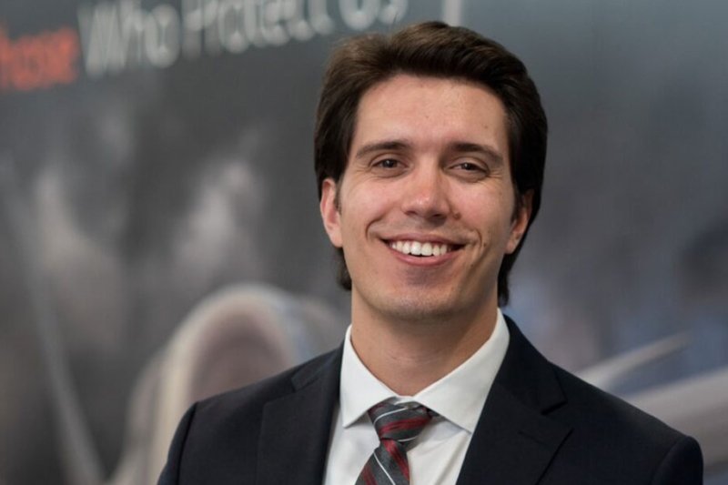 A man in a dark suit