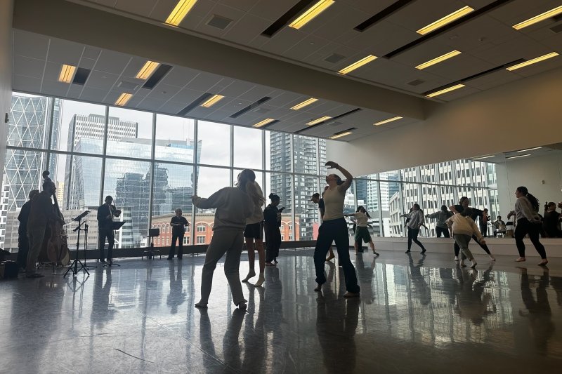 Salve students dancing jazz in Calgary in large room with big windows.