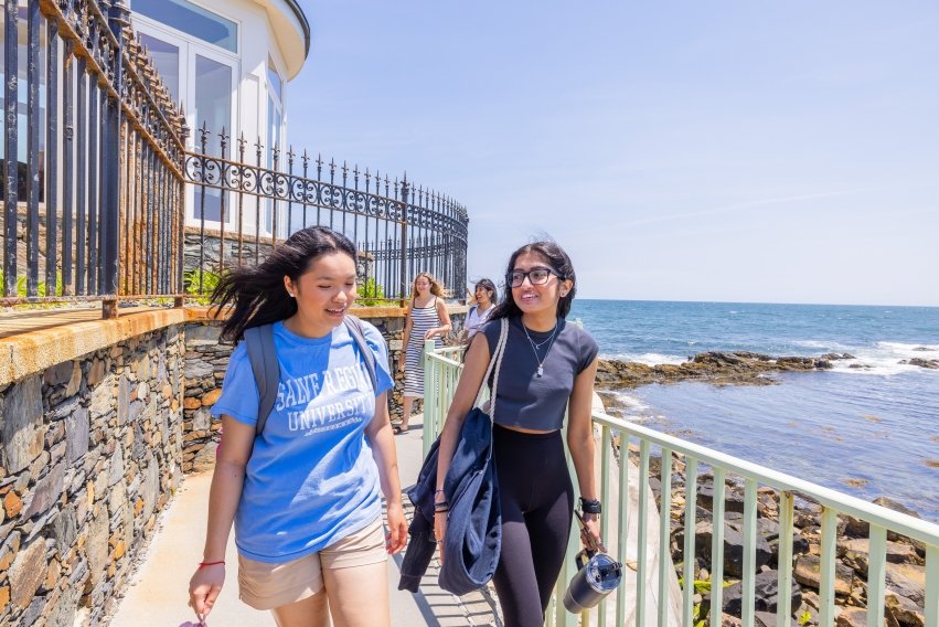 students walking cliff walk