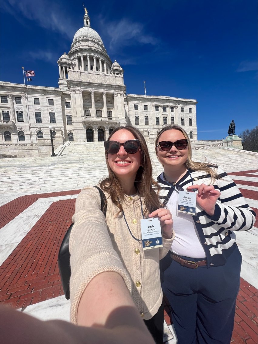 Spengler and Battcher outside of the Rhode Island State House as part of the R.I. Civic Leadership Program.