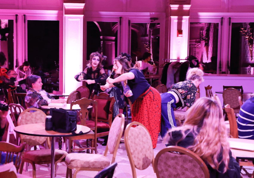 Student performers interacting with the crowd during Salve's "Natasha, Pierre & the Great Comet of 1812."