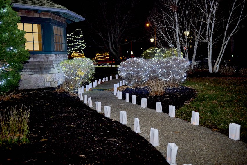 Luminaria lanterns wrap around Our Lady of Mercy Chapel.
