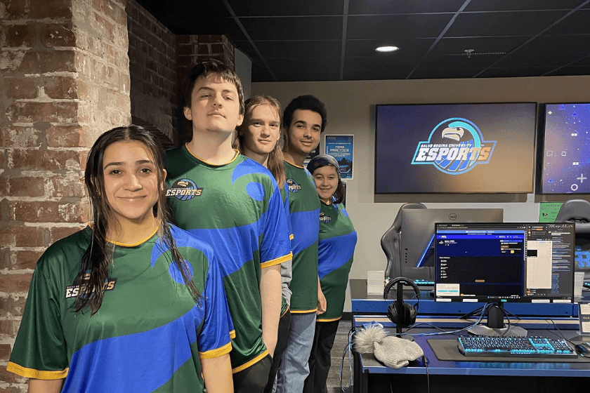 group photo of our eSports team in their gaming room.