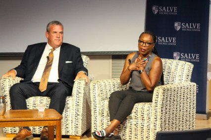 Panelists speak on stage at Pell Center Constitution Day event